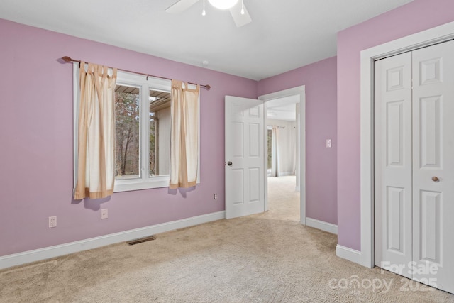 3670 Maple Creek Rd, Rutherfordton, NC 28139 - unfurnished bedroom featuring carpet flooring, baseboards, a closet, and ceiling fan