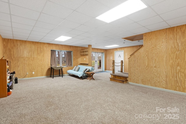 3670 Maple Creek Rd, Rutherfordton, NC 28139 - living area featuring carpet flooring, wood walls, a paneled ceiling, and baseboards