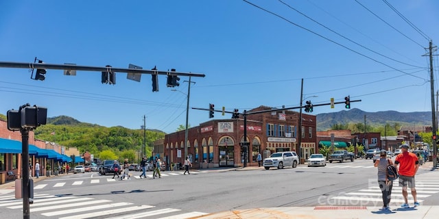 520 Tenth St, Black Mountain, NC 28711 - view of asphalt road featuring traffic lights, sidewalks, and street lights