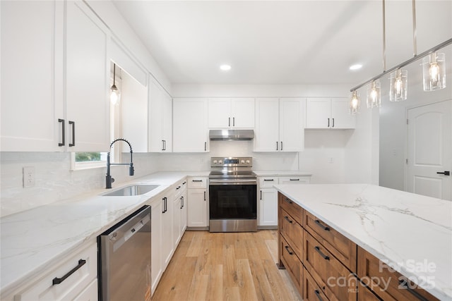 1904 27th Avenue Dr NE, Hickory, NC 28601 - kitchen featuring appliances with stainless steel finishes, a sink, under cabinet range hood, white cabinetry, and recessed lighting
