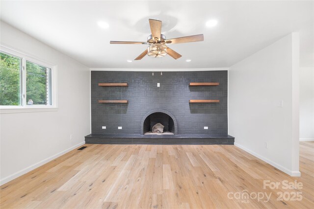 1904 27th Avenue Dr NE, Hickory, NC 28601 - unfurnished living room with a large fireplace, ceiling fan, wood finished floors, baseboards, and recessed lighting