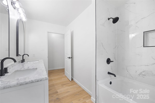 1904 27th Avenue Dr NE, Hickory, NC 28601 - full bathroom with bathtub / shower combination, wood finished floors, double vanity, and baseboards
