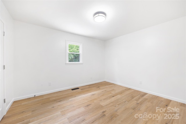 1904 27th Avenue Dr NE, Hickory, NC 28601 - unfurnished room featuring light wood-type flooring and baseboards