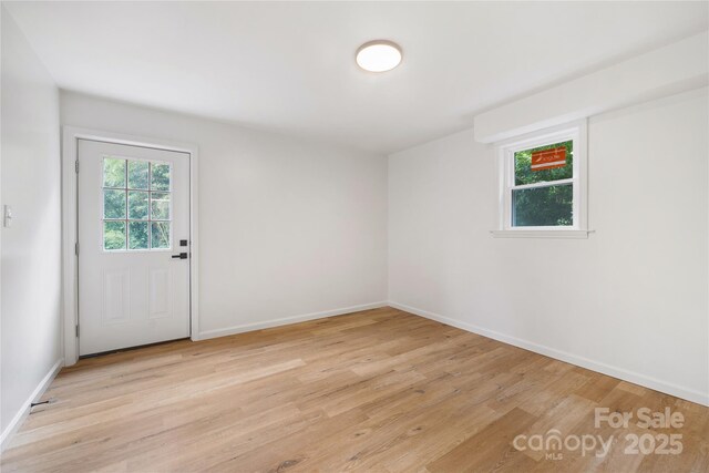 1904 27th Avenue Dr NE, Hickory, NC 28601 - unfurnished room featuring light wood-type flooring and baseboards