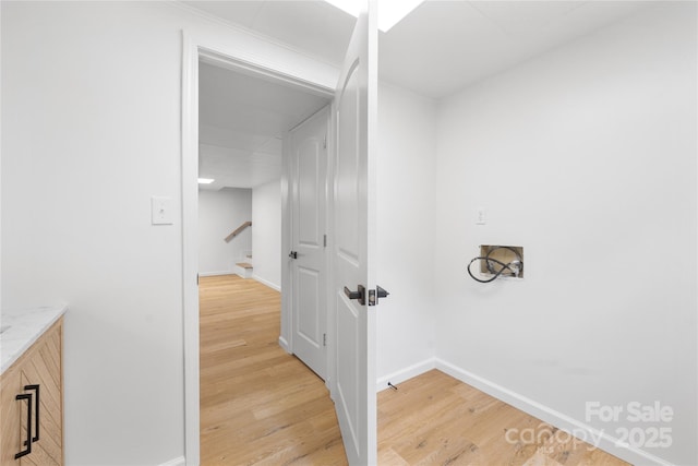 1904 27th Avenue Dr NE, Hickory, NC 28601 - laundry room featuring light wood-style flooring, baseboards, and washer hookup