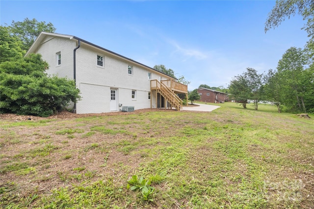 1904 27th Avenue Dr NE, Hickory, NC 28601 - rear view of property with stairway, cooling unit, a deck, and a yard