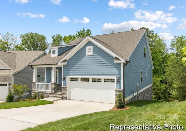 24558 Blue Heron Cir Unit 402, Lancaster, SC 29720 - craftsman-style home featuring covered porch, stone siding, a front lawn, an attached garage, and driveway