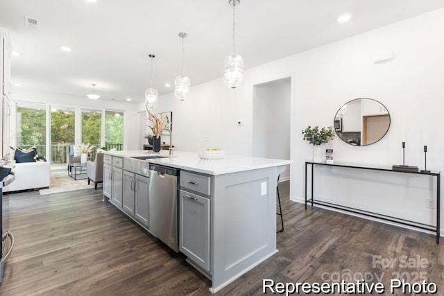 24558 Blue Heron Cir Unit 402, Lancaster, SC 29720 - kitchen with a kitchen island with sink, a sink, dishwasher, gray cabinetry, and dark wood-style floors