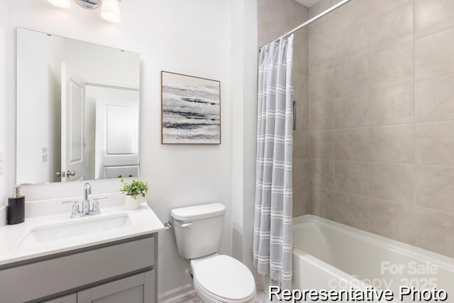 24558 Blue Heron Cir Unit 402, Lancaster, SC 29720 - bathroom featuring shower / bath combo with shower curtain, vanity, and toilet