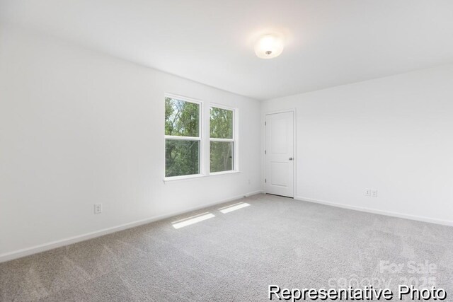 24558 Blue Heron Cir Unit 402, Lancaster, SC 29720 - carpeted spare room featuring baseboards