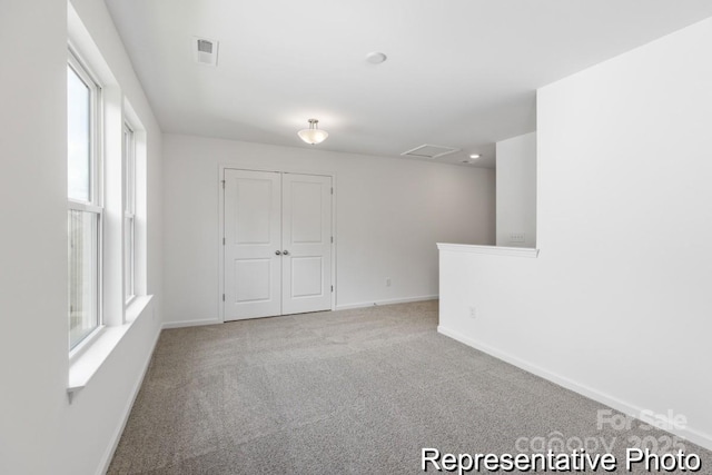 24558 Blue Heron Cir Unit 402, Lancaster, SC 29720 - carpeted empty room with baseboards