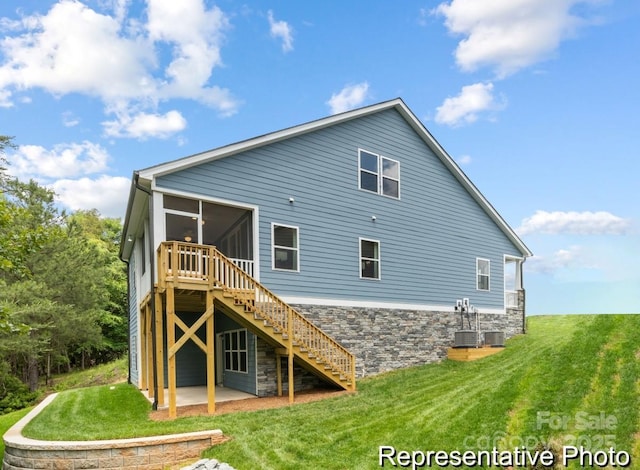 24558 Blue Heron Cir Unit 402, Lancaster, SC 29720 - rear view of property with a sunroom, a lawn, stairway, a patio, and stone siding