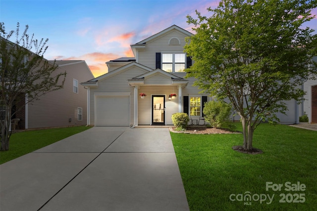 8917 Chalkstone Rd, Charlotte, NC 28216 - traditional-style home featuring concrete driveway, a yard, and a garage