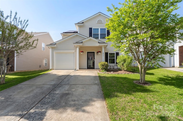 8917 Chalkstone Rd, Charlotte, NC 28216 - traditional home featuring an attached garage, driveway, and a front yard