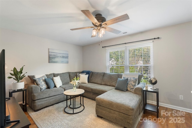 8917 Chalkstone Rd, Charlotte, NC 28216 - living room with ceiling fan, baseboards, wood finished floors, and visible vents