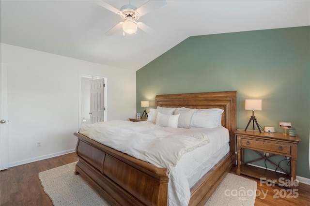 8917 Chalkstone Rd, Charlotte, NC 28216 - bedroom featuring vaulted ceiling, a ceiling fan, wood finished floors, and baseboards