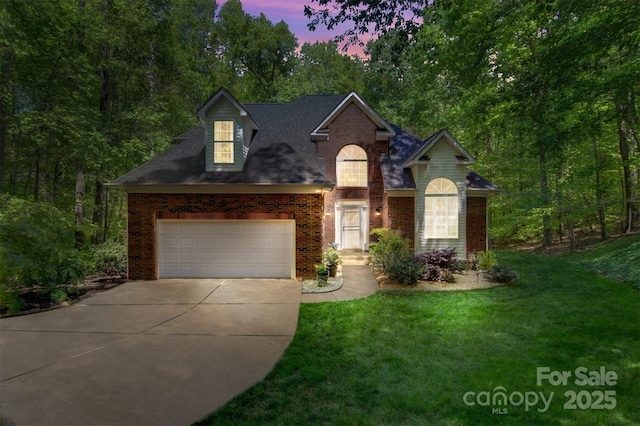 4516 Stryker Dr, Matthews, NC 28104 - traditional home with brick siding, driveway, and a yard