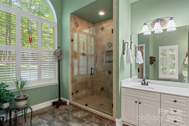 4516 Stryker Dr, Matthews, NC 28104 - full bathroom with baseboards, a stall shower, and vanity