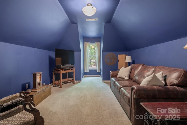 4516 Stryker Dr, Matthews, NC 28104 - living area featuring visible vents, vaulted ceiling, carpet floors, and baseboards