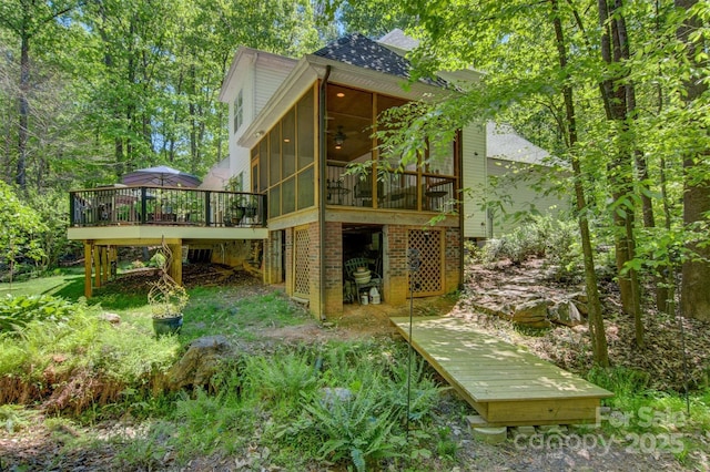 4516 Stryker Dr, Matthews, NC 28104 - exterior space featuring a sunroom, a deck, and a ceiling fan