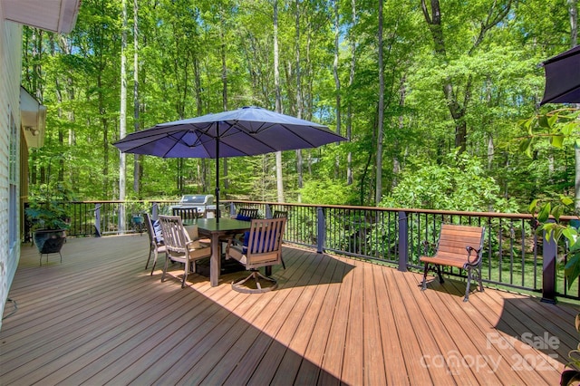 4516 Stryker Dr, Matthews, NC 28104 - deck featuring outdoor dining area and a wooded view