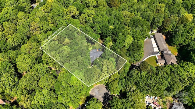 4516 Stryker Dr, Matthews, NC 28104 - birds eye view of property featuring a wooded view