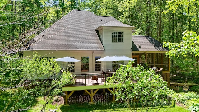 4516 Stryker Dr, Matthews, NC 28104 - rear view of property with a sunroom, a wooden deck, and roof with shingles