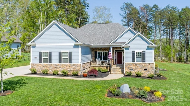 4594 N Wynswept Dr, Maiden, NC 28650 - craftsman inspired home with a porch, stone siding, and a front yard