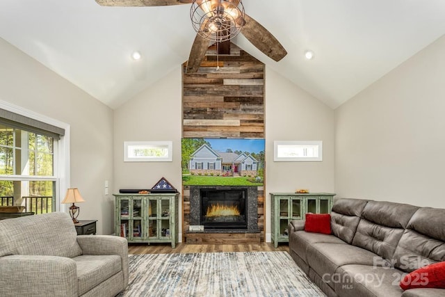 4594 N Wynswept Dr, Maiden, NC 28650 - living room featuring high vaulted ceiling, a ceiling fan, wood finished floors, a glass covered fireplace, and recessed lighting