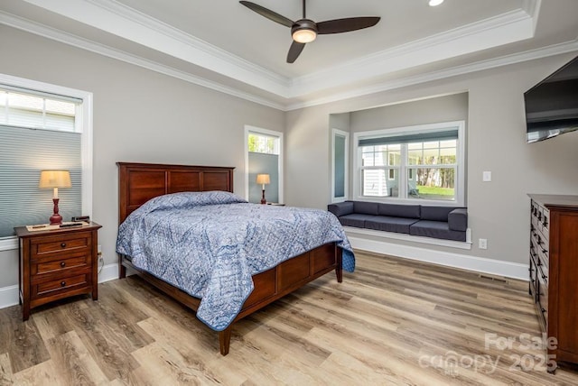 4594 N Wynswept Dr, Maiden, NC 28650 - bedroom with a tray ceiling, light wood-style floors, baseboards, and ornamental molding