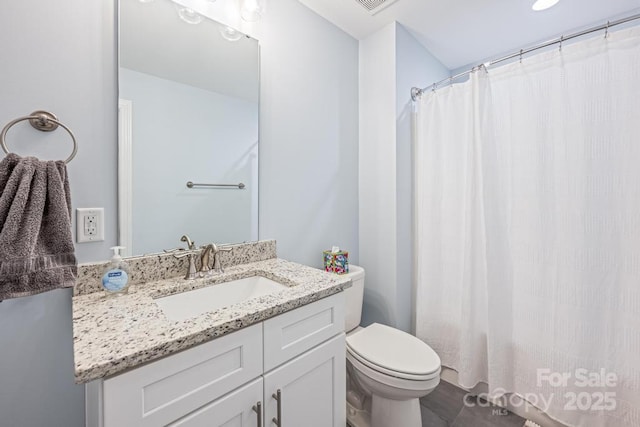 4594 N Wynswept Dr, Maiden, NC 28650 - bathroom with a shower with shower curtain, toilet, and vanity