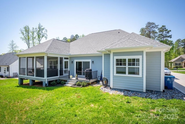 4594 N Wynswept Dr, Maiden, NC 28650 - back of house featuring a lawn, a sunroom, roof with shingles, and a wooden deck