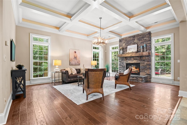14130 Lea Point Ct, Huntersville, NC 28078 - living area featuring dark wood-style floors, a chandelier, beamed ceiling, baseboards, and a fireplace