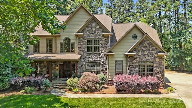 14130 Lea Point Ct, Huntersville, NC 28078 - craftsman house featuring stone siding and covered porch