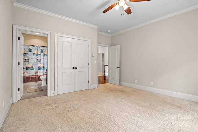 14130 Lea Point Ct, Huntersville, NC 28078 - unfurnished bedroom featuring carpet flooring, crown molding, a closet, ensuite bathroom, and baseboards