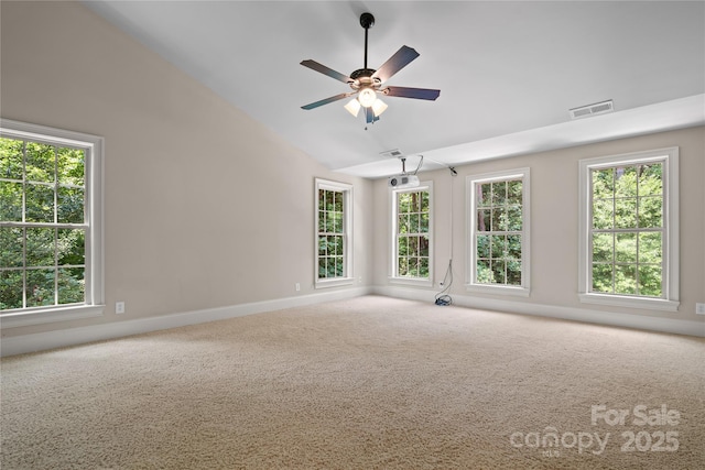 14130 Lea Point Ct, Huntersville, NC 28078 - empty room featuring lofted ceiling, healthy amount of natural light, carpet, baseboards, and a ceiling fan