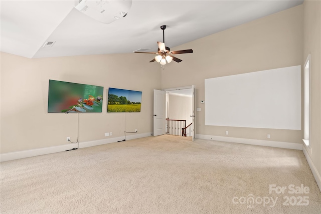 14130 Lea Point Ct, Huntersville, NC 28078 - unfurnished living room with carpet flooring, high vaulted ceiling, ceiling fan, and baseboards