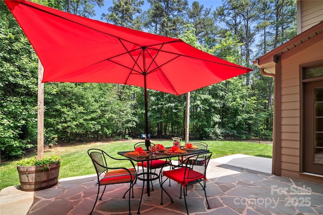 14130 Lea Point Ct, Huntersville, NC 28078 - view of patio / terrace featuring outdoor dining area and view of wooded area