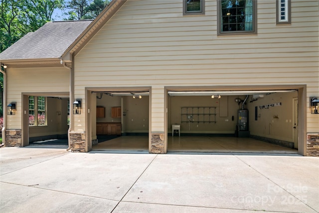 14130 Lea Point Ct, Huntersville, NC 28078 - garage with driveway and water heater