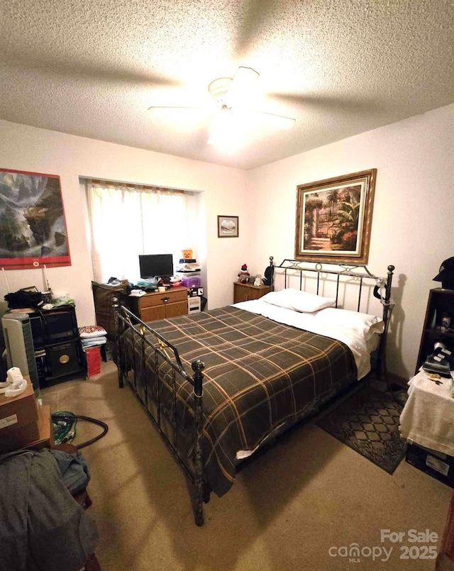 317 Robert Keever Rd, Stanley, NC 28164 - bedroom featuring light carpet, a textured ceiling, and ceiling fan