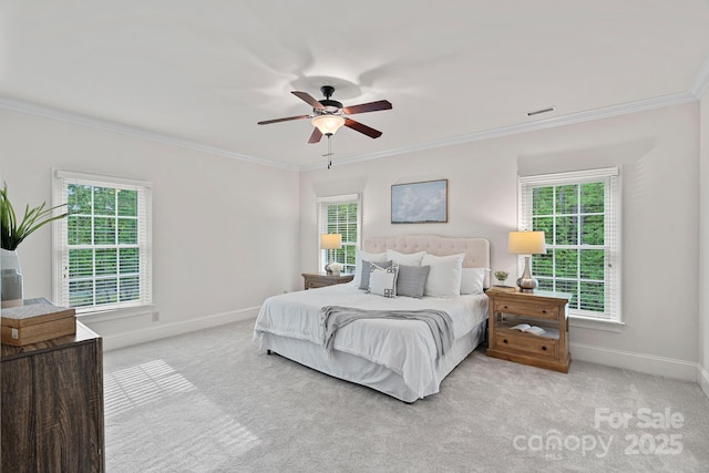 bedroom featuring multiple windows and ornamental molding