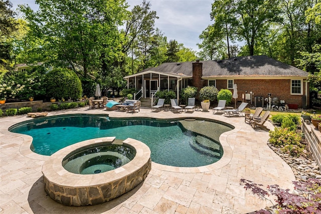 10316 Whitethorn Dr, Charlotte, NC 28277 - view of swimming pool with a sunroom, a pool with connected hot tub, and a patio
