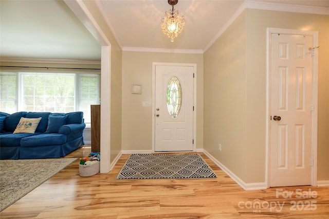 10316 Whitethorn Dr, Charlotte, NC 28277 - entryway featuring light wood finished floors, baseboards, and ornamental molding