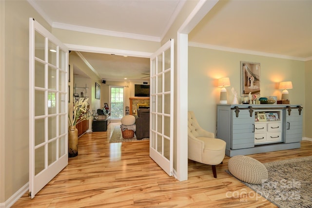 10316 Whitethorn Dr, Charlotte, NC 28277 - living area featuring baseboards, ornamental molding, wood finished floors, and a fireplace