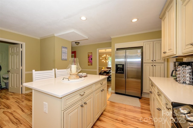 10316 Whitethorn Dr, Charlotte, NC 28277 - kitchen featuring ornamental molding, light countertops, light wood finished floors, and stainless steel fridge