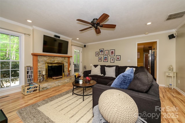 10316 Whitethorn Dr, Charlotte, NC 28277 - living room with plenty of natural light, wood finished floors, visible vents, and ceiling fan