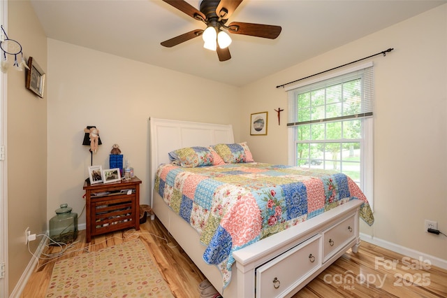 10316 Whitethorn Dr, Charlotte, NC 28277 - bedroom featuring light wood finished floors, baseboards, and ceiling fan