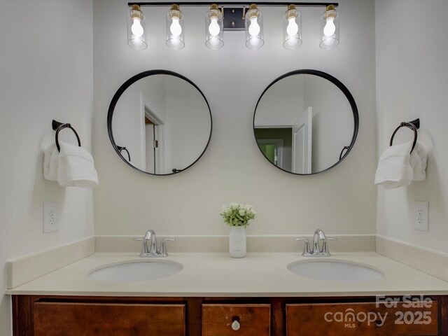 712 Chase Ct, Fort Mill, SC 29708 - bathroom with double vanity and a sink