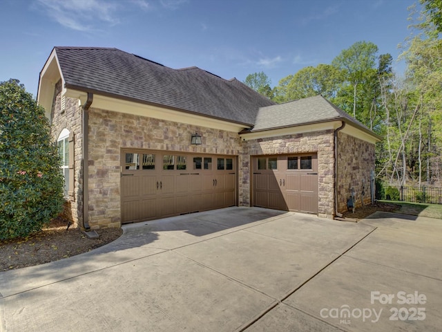712 Chase Ct, Fort Mill, SC 29708 - view of home's exterior featuring stone siding, a shingled roof, and concrete driveway