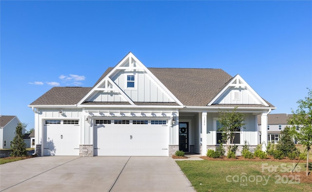 13279 Arnold Palmer Cir Unit 867, Lancaster, SC 29720 - craftsman house featuring board and batten siding, a garage, driveway, and a shingled roof